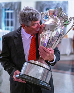 Bailey CEO Keith Mason kissing the coveted trophy.